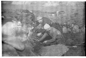 Image of Two men at archeological dig